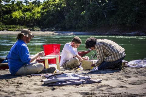 Three student researches by Amazon river